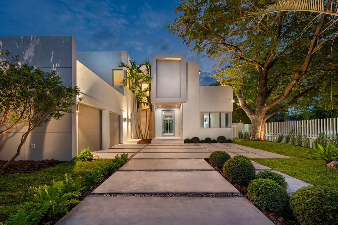 Modern luxury home exterior showcasing window film value