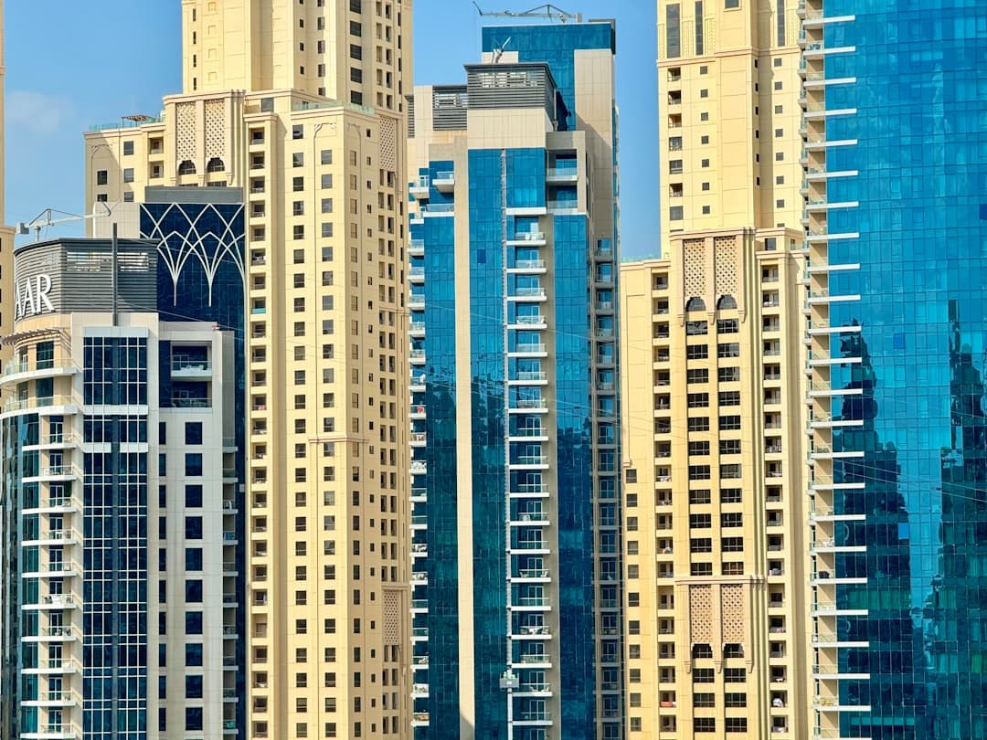 Modern residential buildings in Dubai with large glass facades