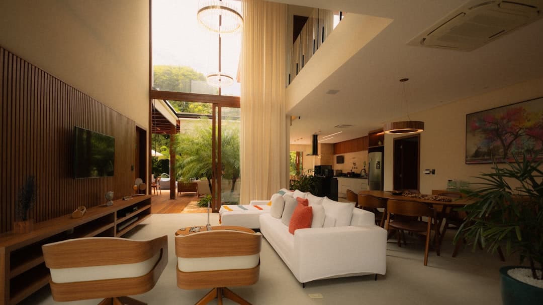 Bright living room with large windows and natural sunlight