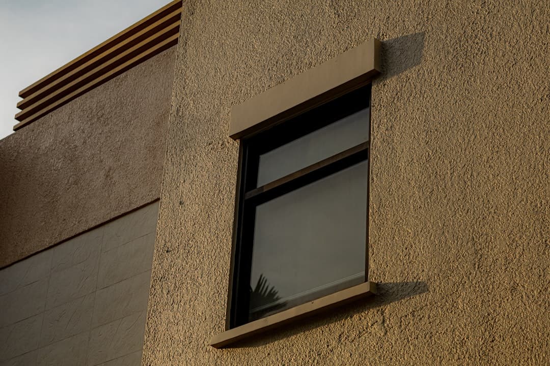 Modern home exterior with privacy window film