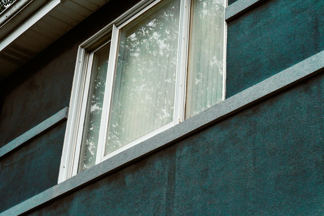 Large glass windows with shatter-proof security film
